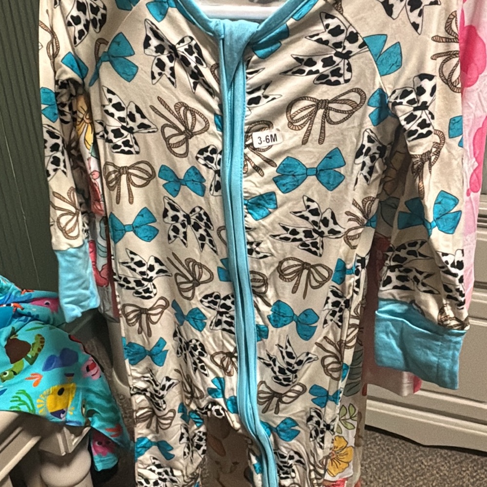 Baby Onesie with Bow and Animal Print